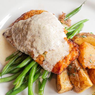 Parmesan Crusted Herb Salmon, with citrus butter, sauteed green beans, and potatoes