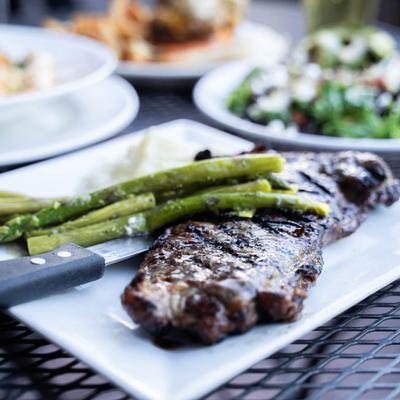 New York Strip with mashed potatoes and asparagus.