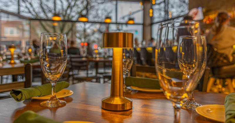 Diner table, wine glasses, diner, close set up