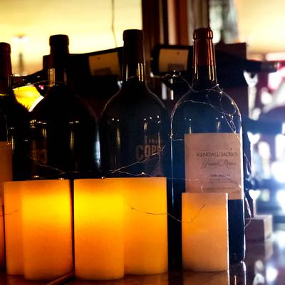 Wine bottles and candles.