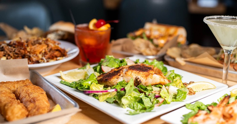 Assorted food and cocktails, side view