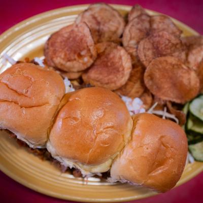 BBQ Pork Sliders, and a side of potato chips.