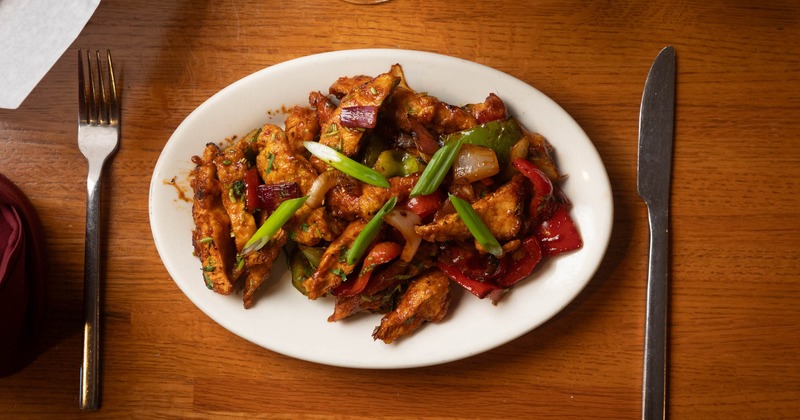 Chili chicken on a wooden table