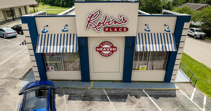 Exterior, aerial view to restaurant entrance and part of parking lot