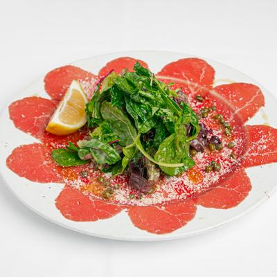 Beer Carpaccio, with capers, parmesan, lemon, and olive oil.