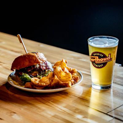 Bacon cheeseburger, with sidewinder fries, and a glass of beer.