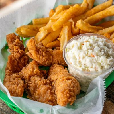 Fried chicken with fries and dip.