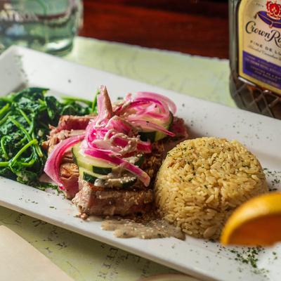 Ahi tuna, rice, and sauteed spinach.