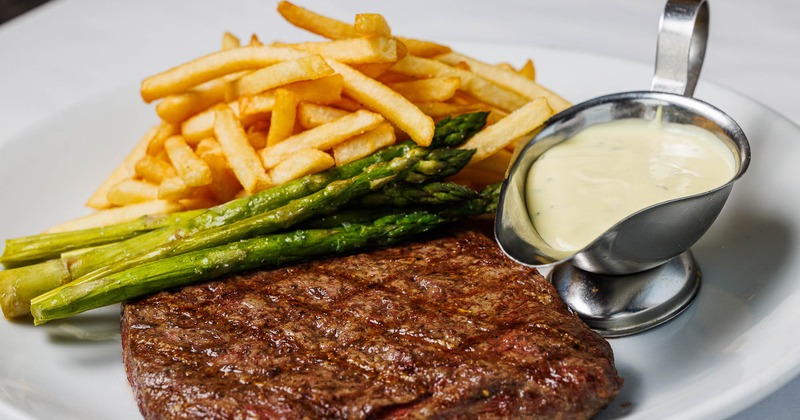 Steak and fries with asparagus and truffle vinaigrette