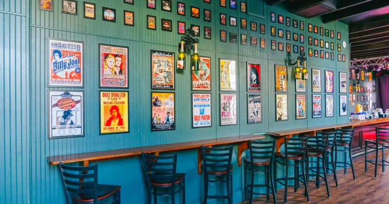 Interior, bar stools with wall-table, music art on the wall