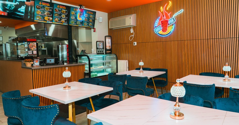 Interior, tables and chairs ready for guests