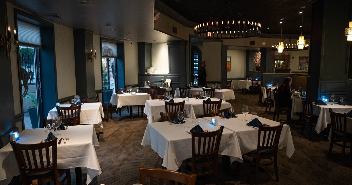 Interior, dining area, tables ready for guests