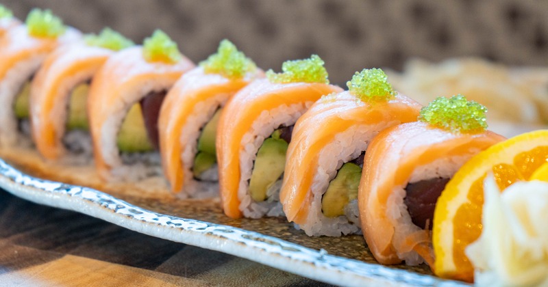 Tuna and avocado sushi rolls, wrapped in salmon