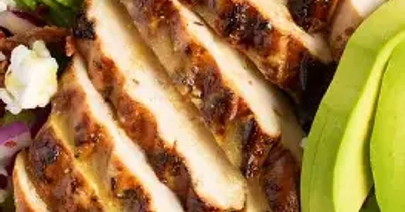 sliced chicken breast with avocado slices