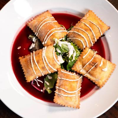 Fried Duck Ravioli, port wine reduction.