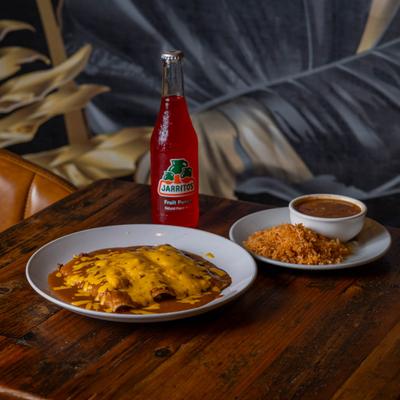 Beef Enchiladas, served with a drink.