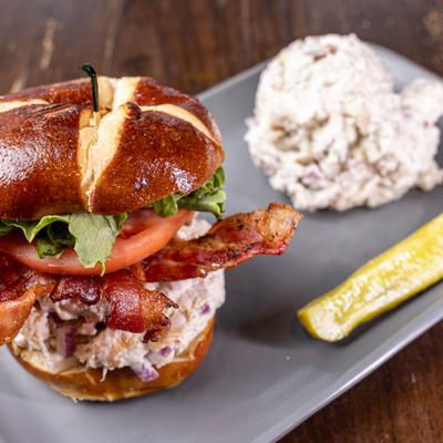 Served chicken salad club sandwich.
