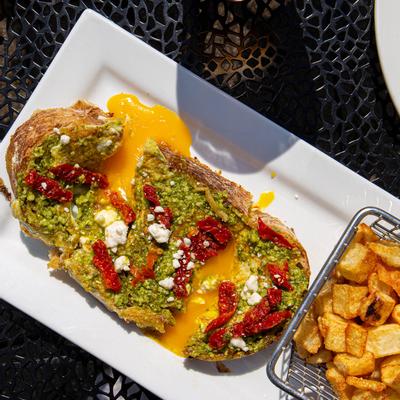 Sandwich with dips, baked potato on the side