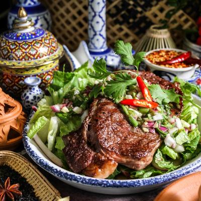 Grilled meat and green salad