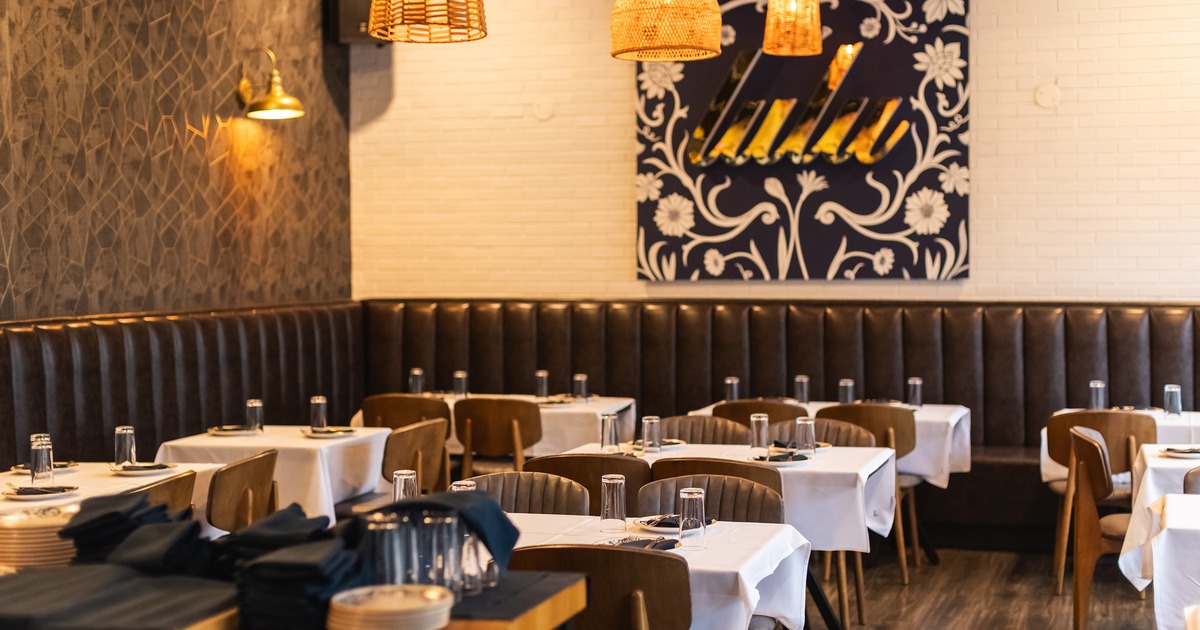 Cozy interior dining area with set tables