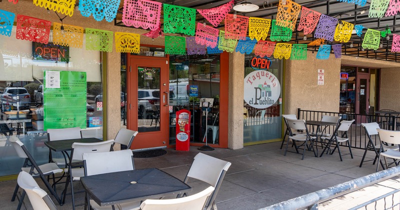 Exterior seating area with chairs and tables