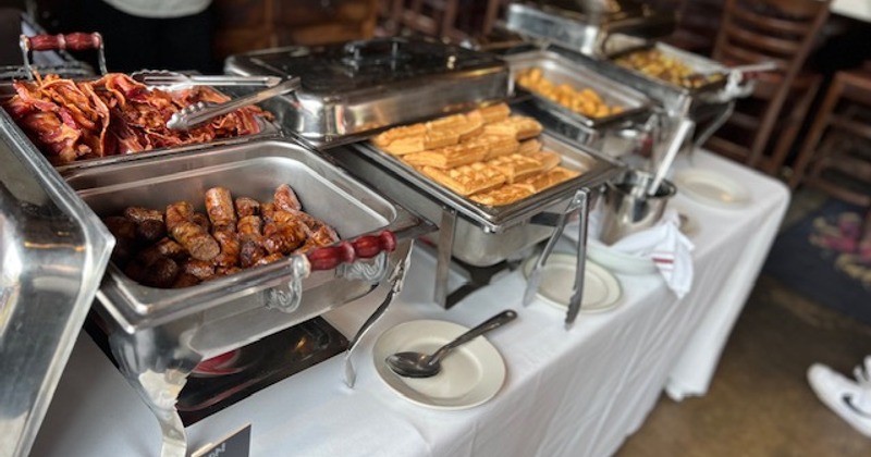 Chafing dishes with food on a buffet table