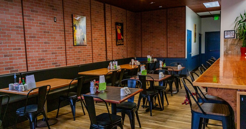 Interior, seating area with tables and chairs