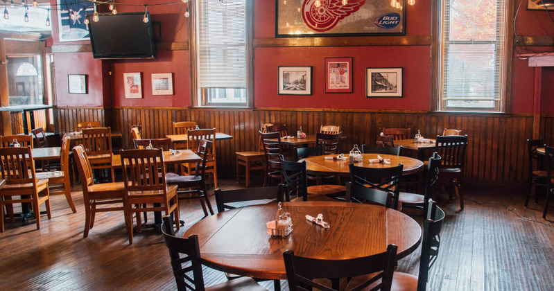 Interior, round tables in dining area