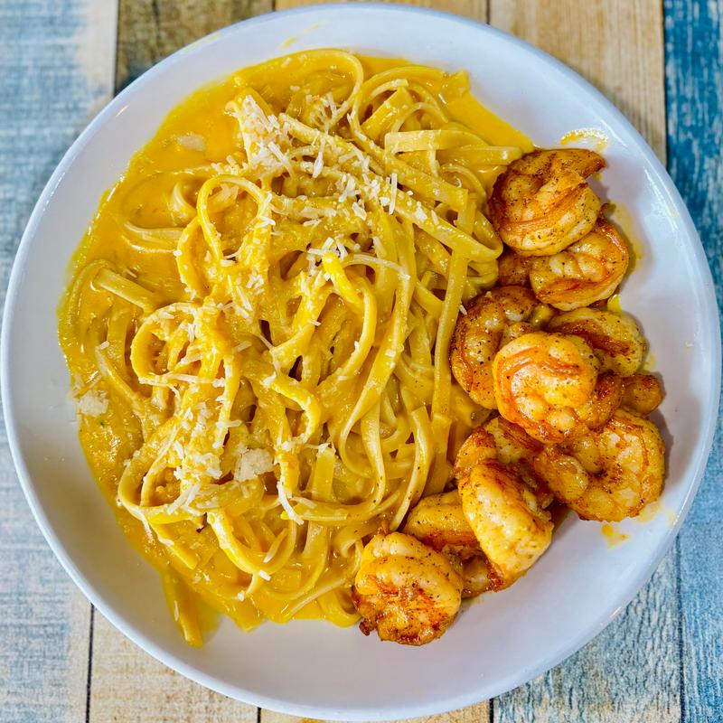 Fettuccini a la Huancaina  con Camarones parrilleros photo