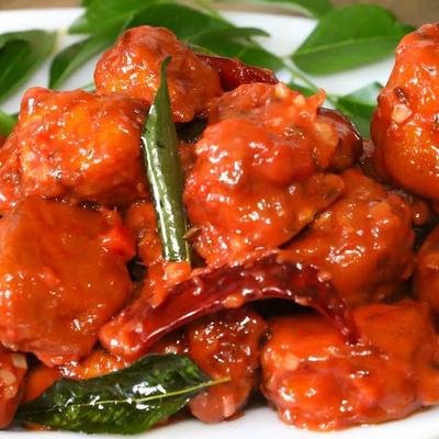 Deep fried boneless chicken, seasoned with herbs and spices.