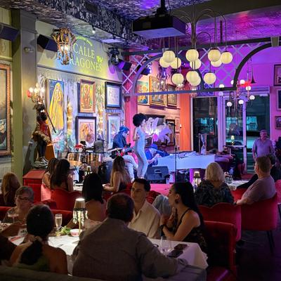 People having dinner while the band is playing.
