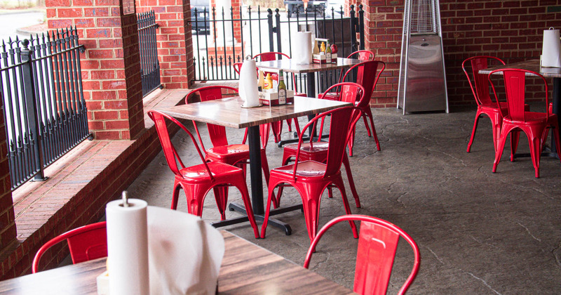 Exterior, tables outside ready for guests