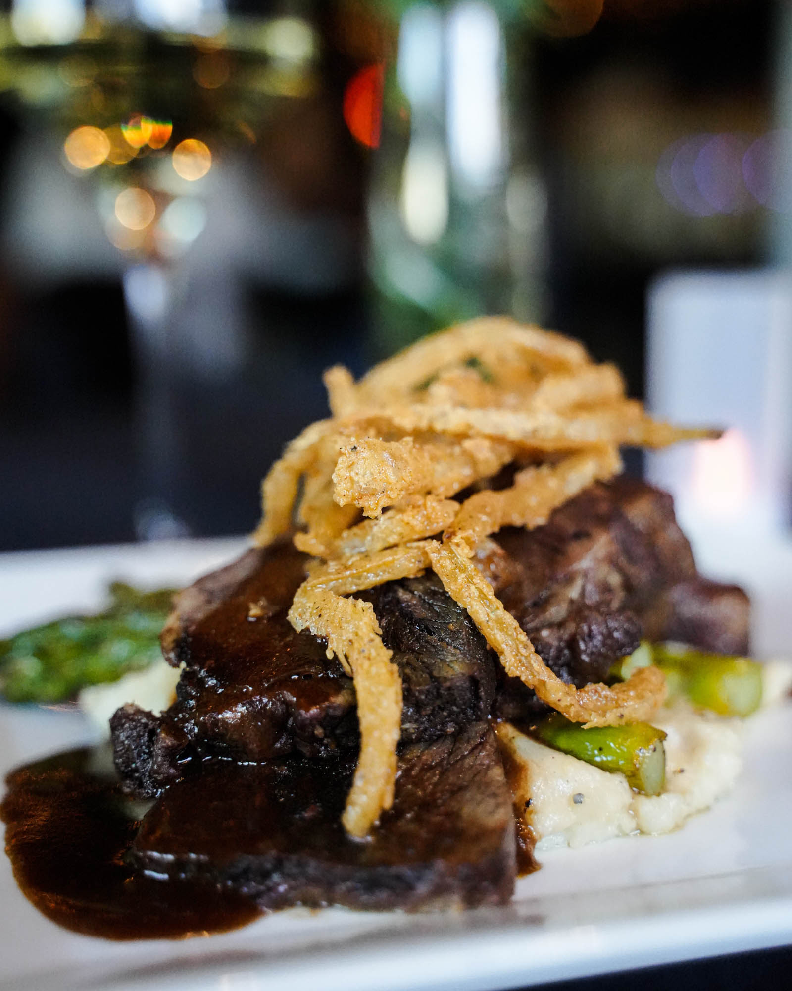 Braised Short rib with red wine reduction sauce and crispy fried onions Virginia Beach VA