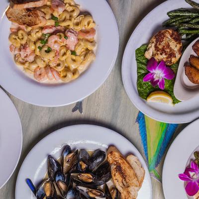Multiple food plates, overhead view