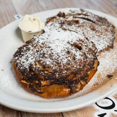Cinnamon rolls with powdered sugar.