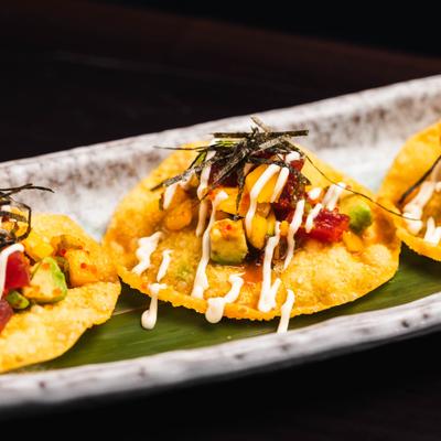 Crispy wontons topped with tuna, avocado, mango, masago, scallions, seaweed, and mayo.