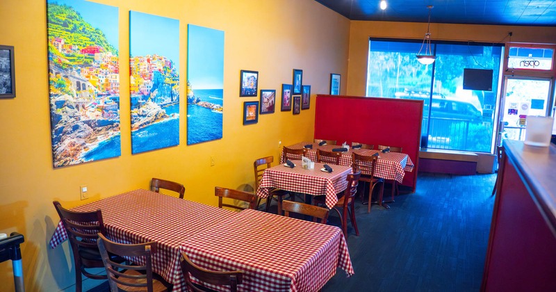 Interior, tables and chairs, pictures on the wall