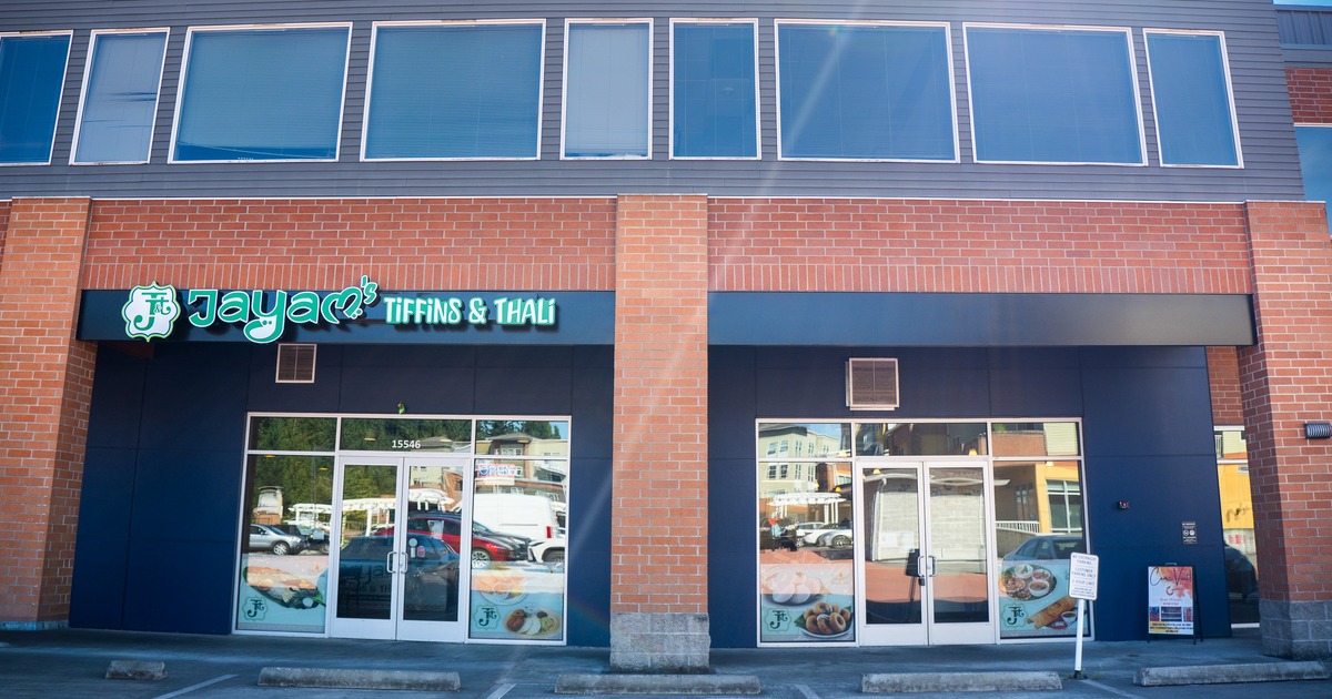 Exterior, front view to restaurant, part of parking lot