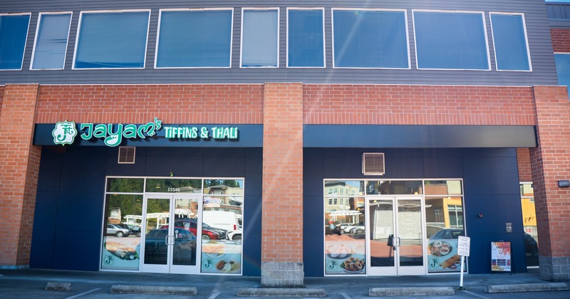 Exterior, front view to restaurant, part of parking lot