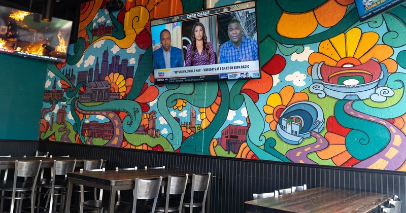 Seating area, colorfully painted wall