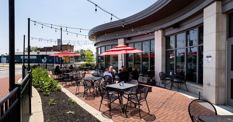 Exterior seating area, lights, tables and chairs