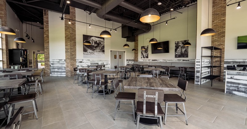 Interior, seating area with booths in the back