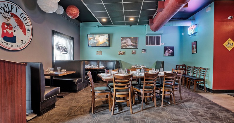 Interior, booths and set tables ready to receive guests