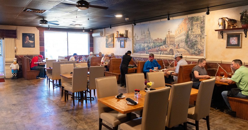 Cozy interior dining area with guests enjoying their food