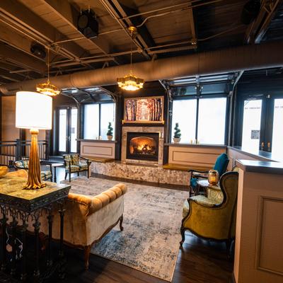 Lounge seating  with a fireplace.