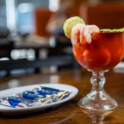 Shrimp Cocktail served with crackers.