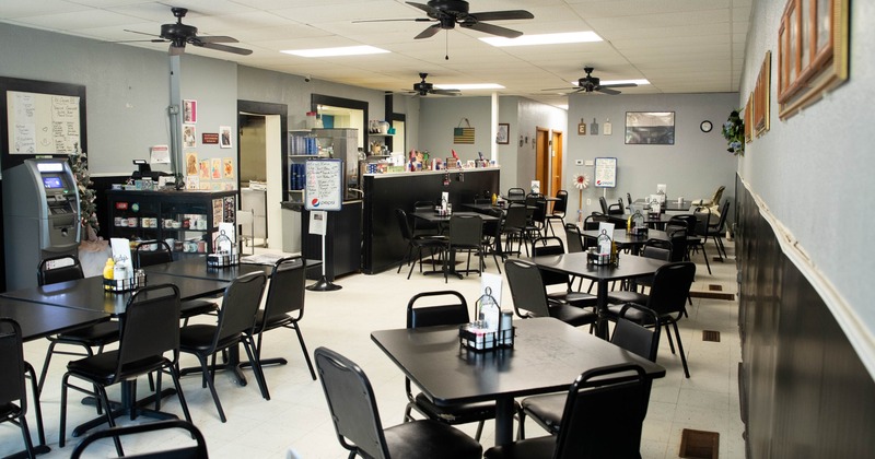 Interior, dining area with tables and chairs
