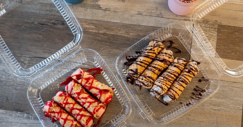 Cannolis with chocolate syrup