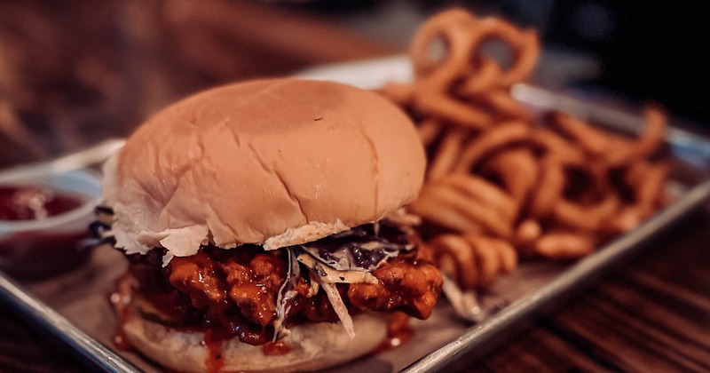 Fried chicken sandwich and onion rings