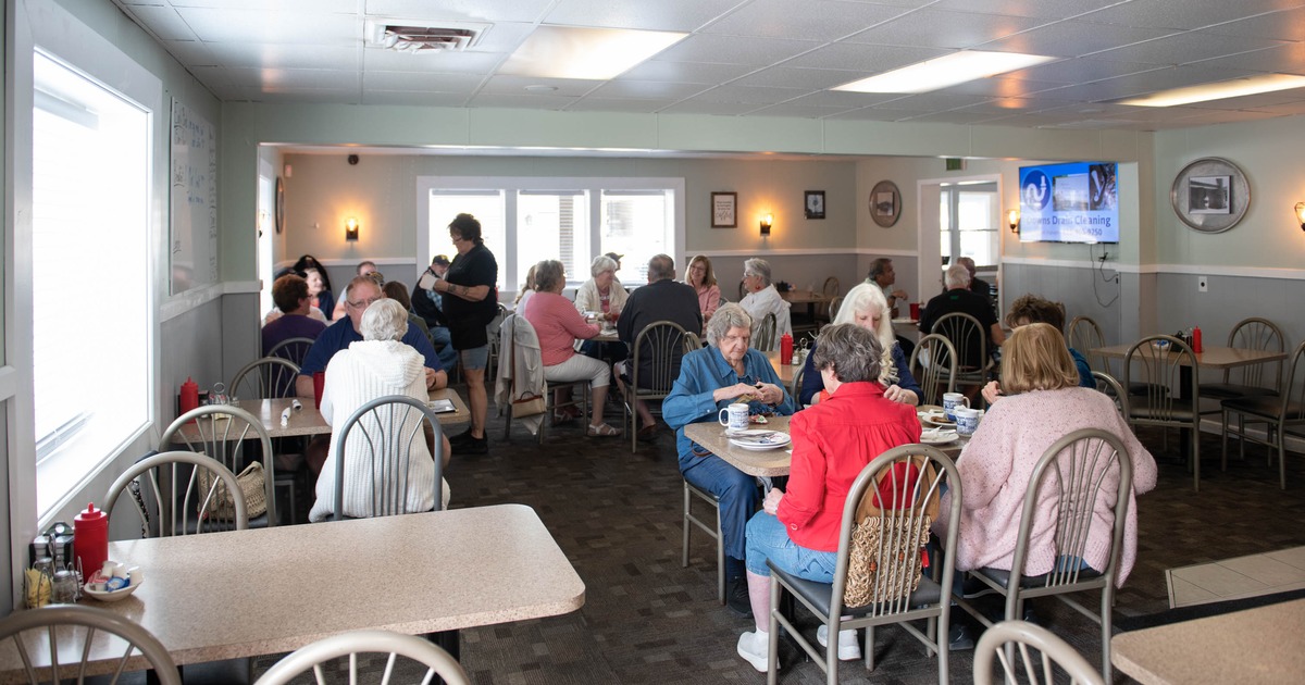 Interior, tables and chairs, guests sitting and enjoying their food